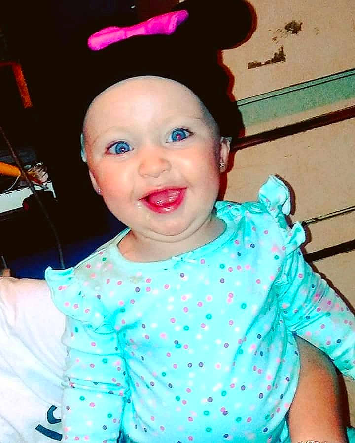 Emaleigh is registered to the contest to win money with this photo: cheek, child, cool, day, eye, face, facial_expression, fashion_accessory, forehead, hair, hair_accessory, hairstyle, head, headgear, nose, person, pink, product, skin, smile