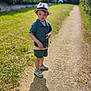 Malone participe au concours pour gagner de l'argent avec cette photo : boy, casual, child, daytime, garden, grass, greenery, happy, hat, house, nature, outdoor, path, portrait, shadow, shirt, shorts, sneakers, summer, sunlight