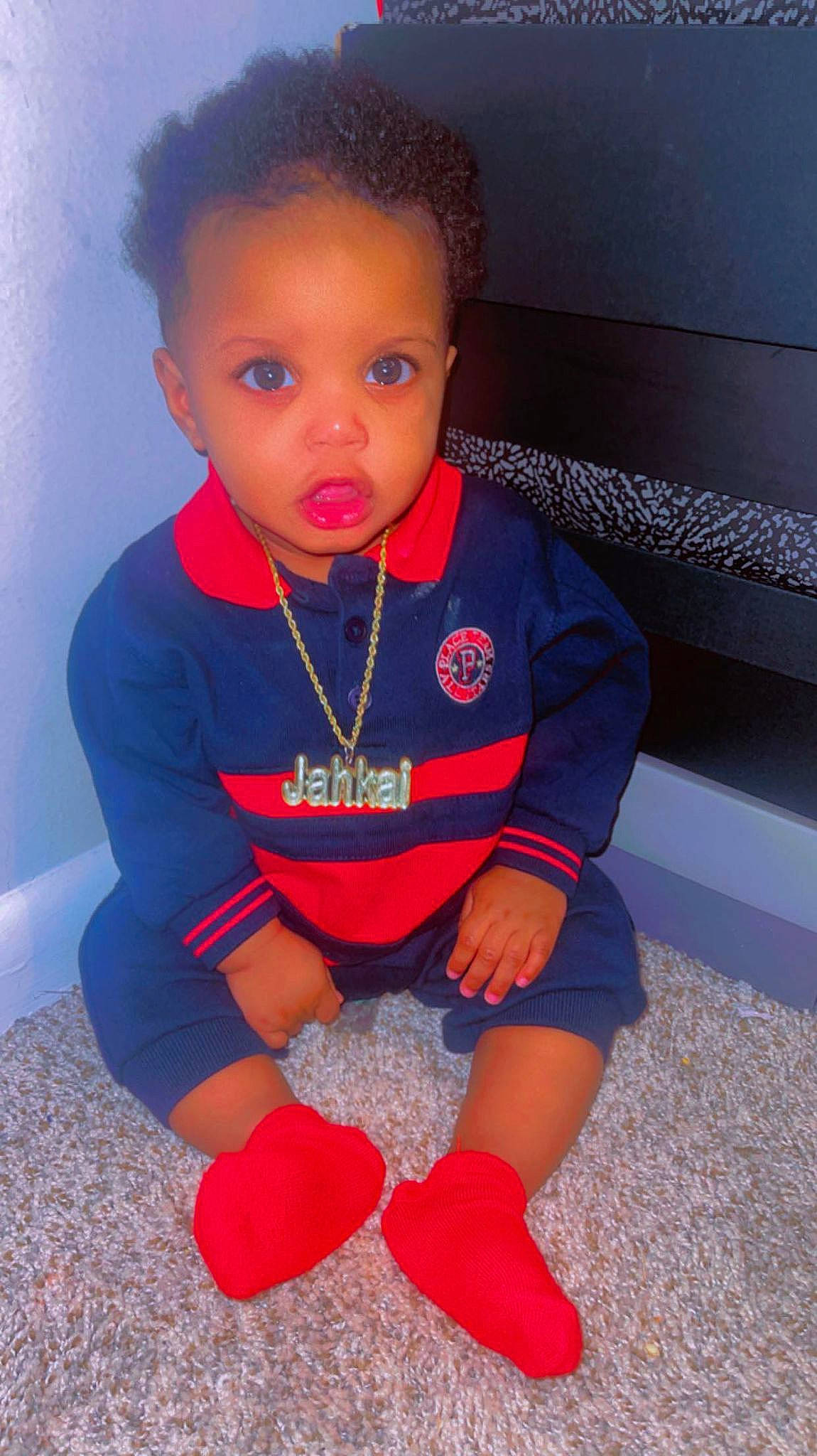 Jakai joined the competition — help win amazing prizes! baby_toddler_clothing, face, flooring, hand, happy, head, human_body, iris, joint, knee, lip, mouth, neck, nose, person, red, shoulder, sleeve, t_shirt, thigh