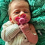 Oakley joined the competition — help win amazing prizes! newborn, baby, pacifier, blanket, infant, closeup, cute, sleepy, soft, patterned_clothing, hand, face, skin, cozy, lying_down, indoors, healthcare, hospital, pink, turquoise