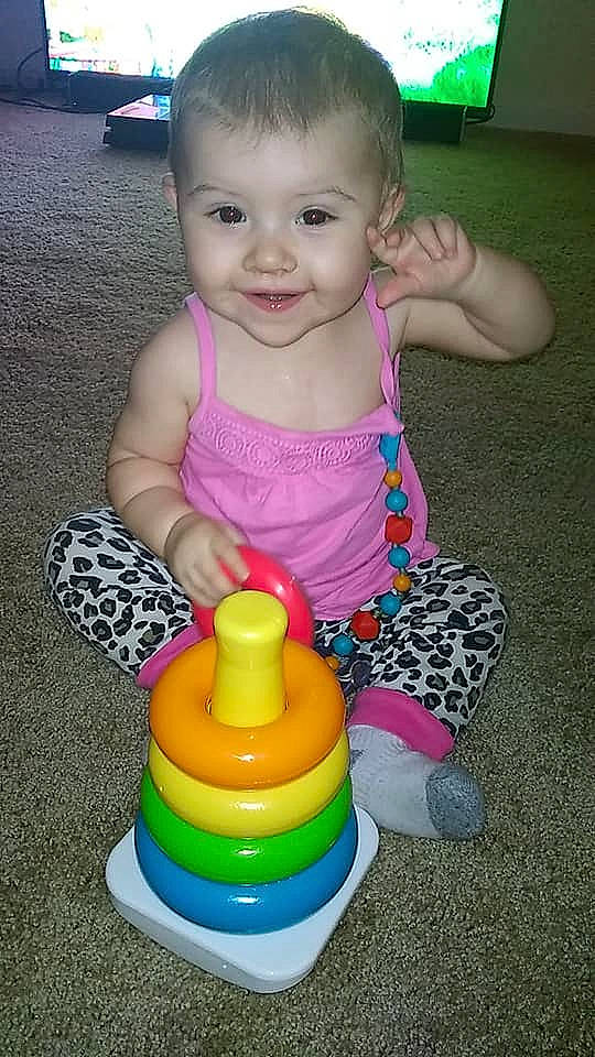 Azalee joined the competition — help win amazing prizes! baby_products, boy, cheek, child, fun, girl, hand, infant, person, play, product, sitting, skin, smile, toddler, toy, yellow