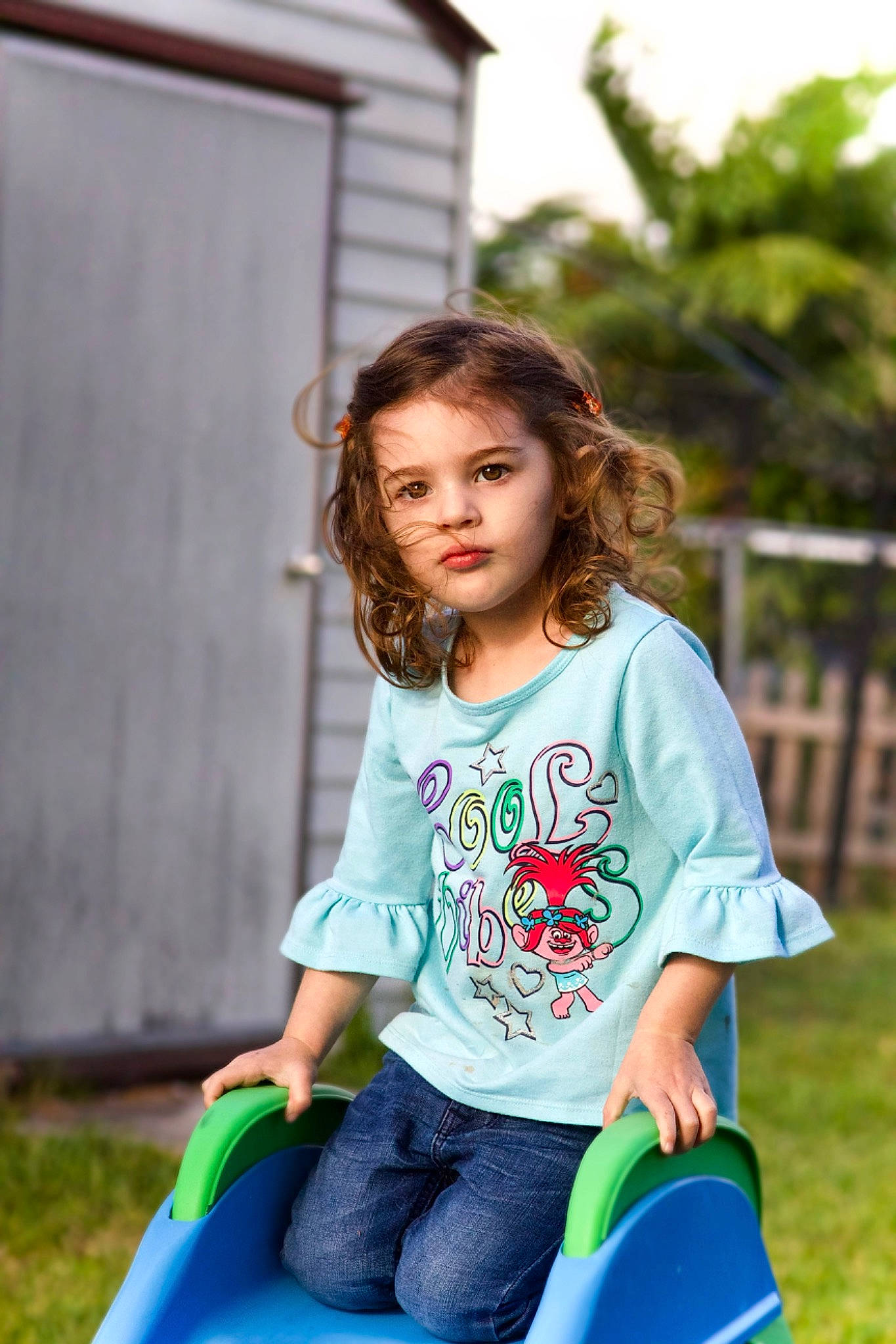 Arabella joined the competition — help win amazing prizes! blue, child, city, denim, electric_blue, face, flash_photography, fun, grass, happy, jeans, leisure, outdoor_play_equipment, person, recreation, sitting, standing, summer, t_shirt, toddler