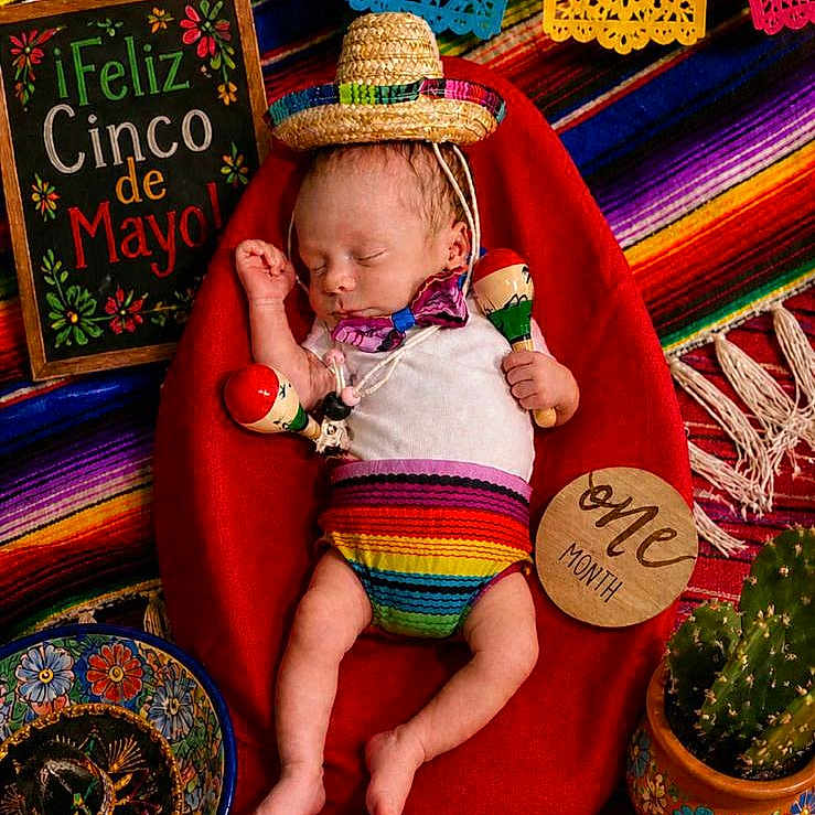 Zakariya joined the competition — help win amazing prizes! baby, infant, sleeping, sombrero, maracas, red_beanbag, colorful_blanket, cactus, sign, celebration, fiesta, cinco_de_mayo, one_month, decorations, mexican_theme, clothing, cute, holiday, festive, portrait