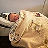 Oaklynn is registered to the contest to win money with this photo: newborn, baby, sleeping, infant, face, portrait, blanket, swaddled, pacifier, cozy, bedroom, indoors, nap, resting, bedding, cushion, soft_lighting, peaceful, nursery, photography