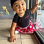 toddler, child, baby, crawling, floor, window, glass_door, toy, playpen, indoor, clothing, minnie_mouse, hat, red, black, polka_dots, cute, face, eyes, hand