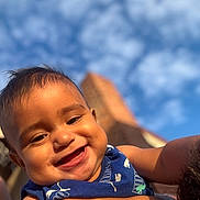 Brighton joined the competition — help win amazing prizes! baby, smiling, child, blue_sky, clouds, outdoor, portrait, happy, face, skin, sleeveless, person, closeup, sunlight, cheeks, arm, holding, infant, cute, daytime