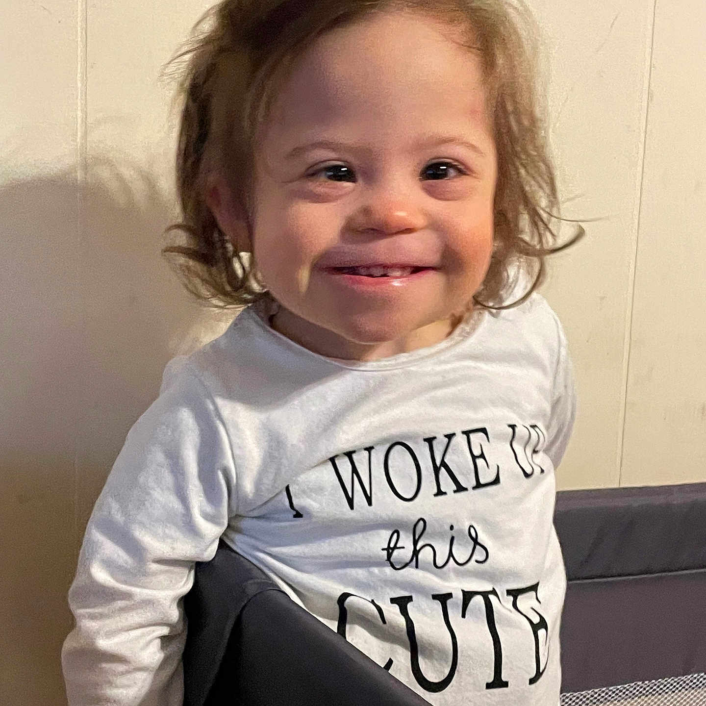 Abigale is registered to the contest to win money with this photo: accessories, baby, babylaughing, blonde, child, clothing, face, female, girl, hair, happy, head, person, photography, portrait, shirt, sleeve, smile, t_shirt, text