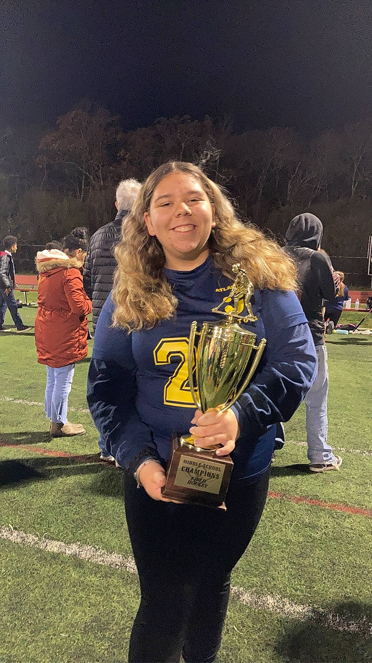 Julianne is registered to the contest to win money with this photo: championship, competition_event, crowd, event, fun, grass, happy, joy, lawn, leisure, night, person, plant, player, recreation, smile, sports, t_shirt, team, team_sport