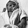 baby, infant, pacifier, bathrobe, towel, blanket, soft_texture, black_and_white, portrait, cute, child, newborn, face, hand, lying_down, wrapped, cozy, sleepwear, indoors, closeup