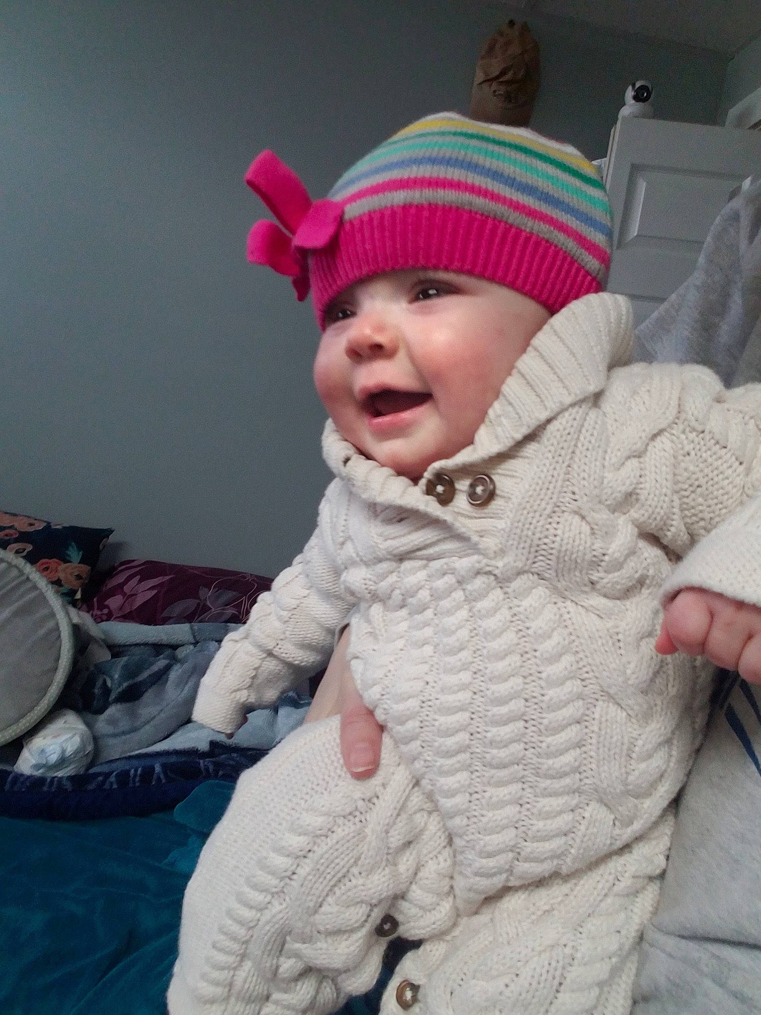 Kensliegh Carol is registered to the contest to win money with this photo: beanie, bonnet, cap, child, cool, fun, hat, headgear, headwear, infant, knit_cap, knitting, outerwear, person, pink, product, skin, smile, textile, toddler