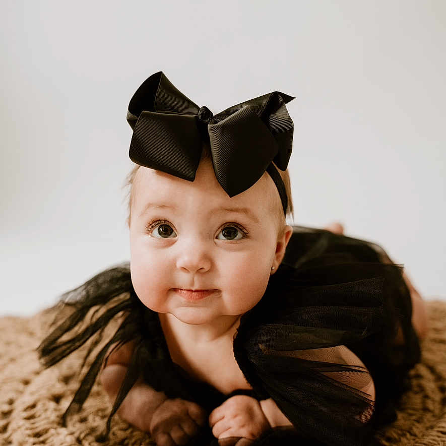 Bexley is registered to the contest to win money with this photo: accessories, baby, bodypart, cap, clothing, face, finger, glasses, goggles, hand, happy, hat, head, newborn, person, photography, portrait, smile, sunglasses, wood