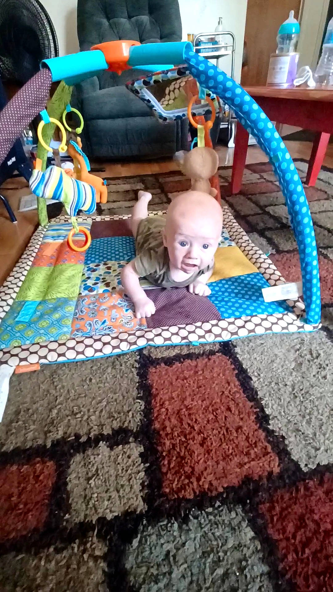 Levi joined the competition — help win amazing prizes! baby, blue, carpet, child, craft, crochet, floor, flooring, green, leisure, linens, magenta, pattern, person, textile, thread, toddler, toy, wood, wool