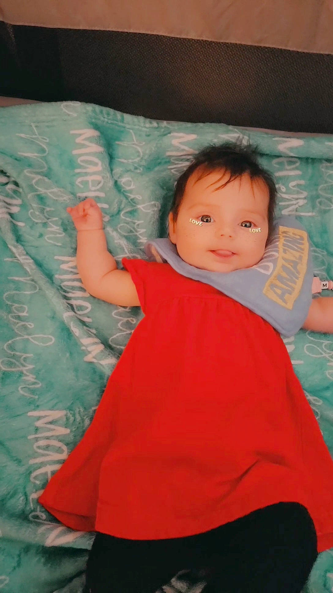 Maelyn joined the competition — help win amazing prizes! baby, baby_toddler_clothing, cheek, child, comfort, elbow, flooring, fun, happy, leisure, linens, person, pink, shoulder, sitting, sleeve, smile, t_shirt, textile, toddler