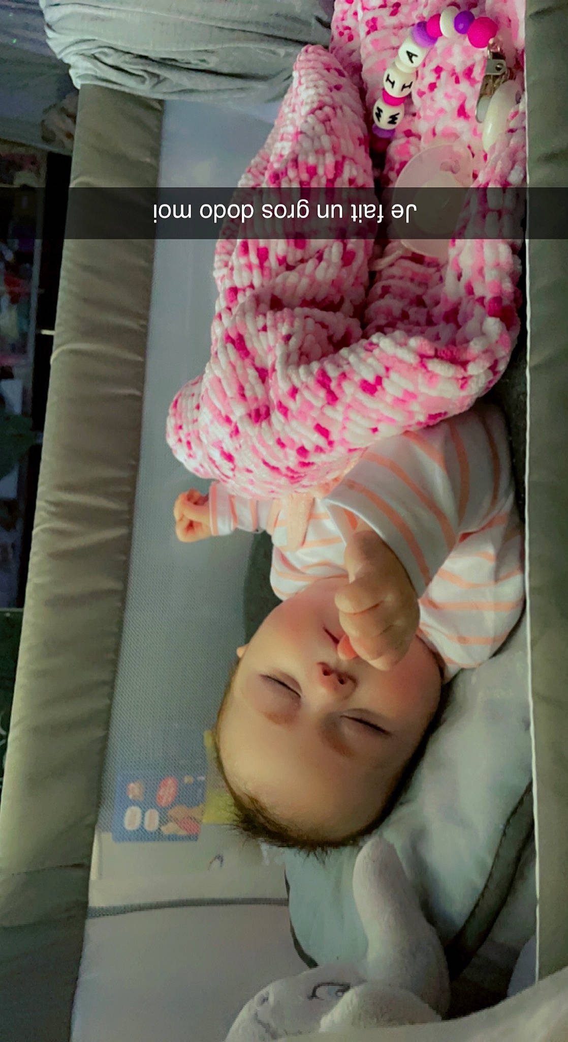 Mia participe au concours pour gagner de l'argent avec cette photo : baby, baby_products, baby_toddler_clothing, bedtime, cheek, child, comfort, eyelash, font, linens, lip, magenta, mouth, nap, pattern, peach, person, pink, room, skin