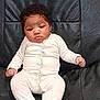Tahyna a rejoint le concours — aidez-le/la à gagner de superbes lots ! baby, infant, onesie, white_clothing, black_leather_couch, seated, indoor, cute, chubby_cheeks, expression, face, portrait, child, young, human, furniture, relaxing, casual, skin, hair