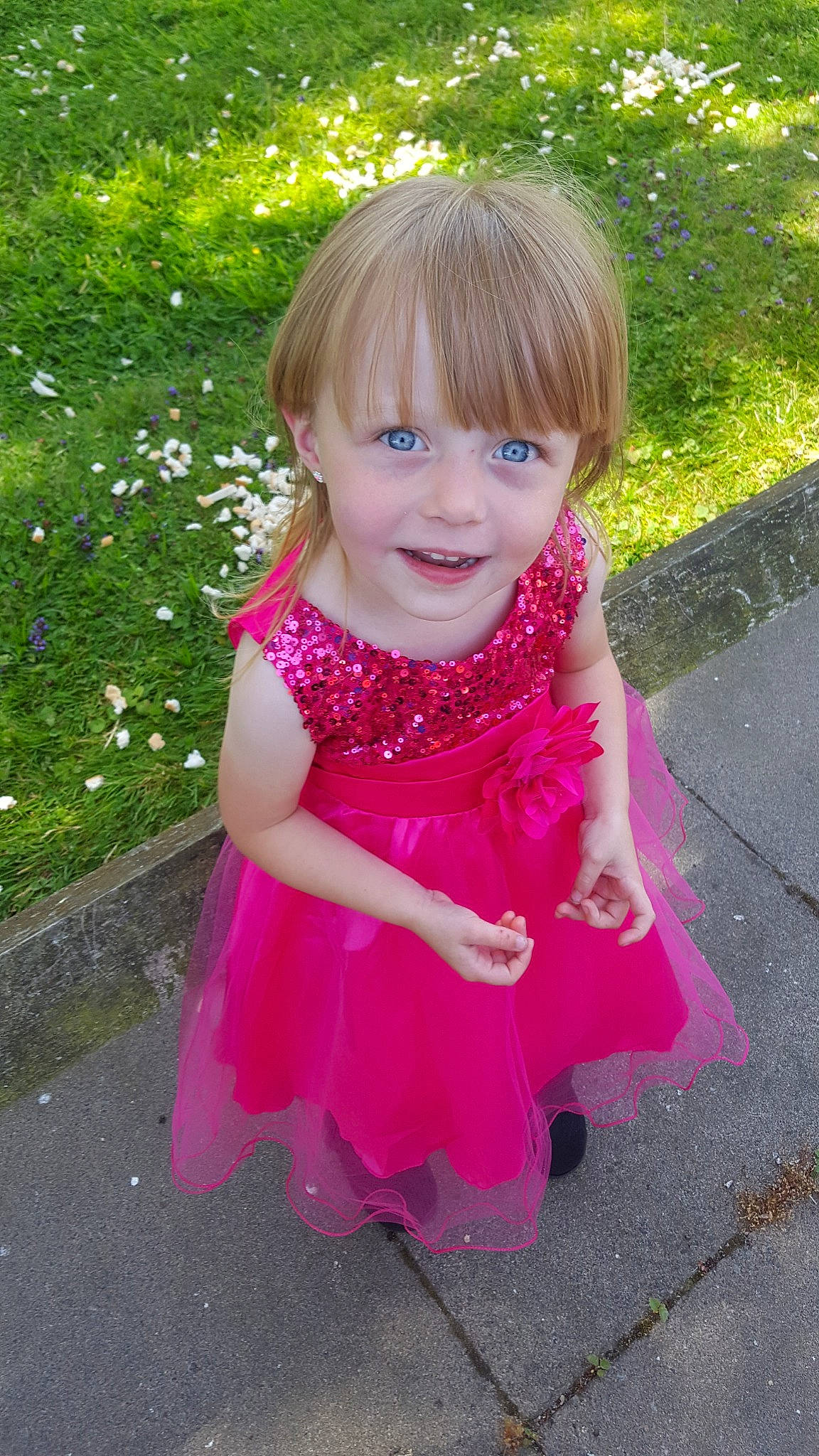 Grace is registered to the contest to win money with this photo: child, clothing, costume, dress, grass, joy, magenta, pattern, person, pink, smile, summer, toddler