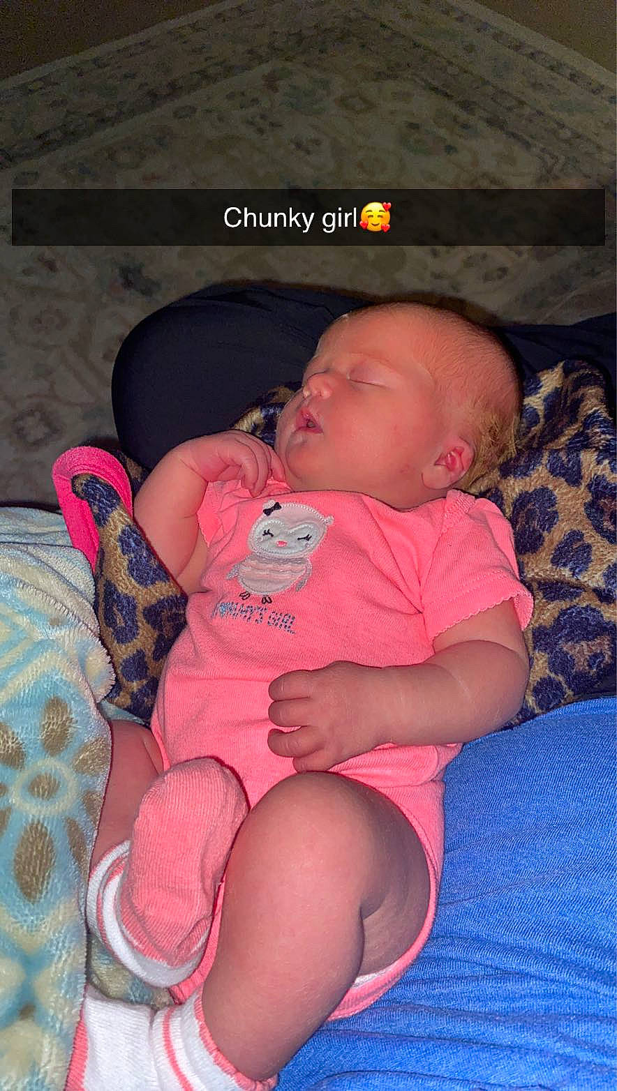 Ainzley is registered to the contest to win money with this photo: abdomen, baby, baby_toddler_clothing, cheek, child, comfort, eye, finger, fun, human_leg, knee, lap, mouth, person, pink, room, skin, thigh, thumb, toddler