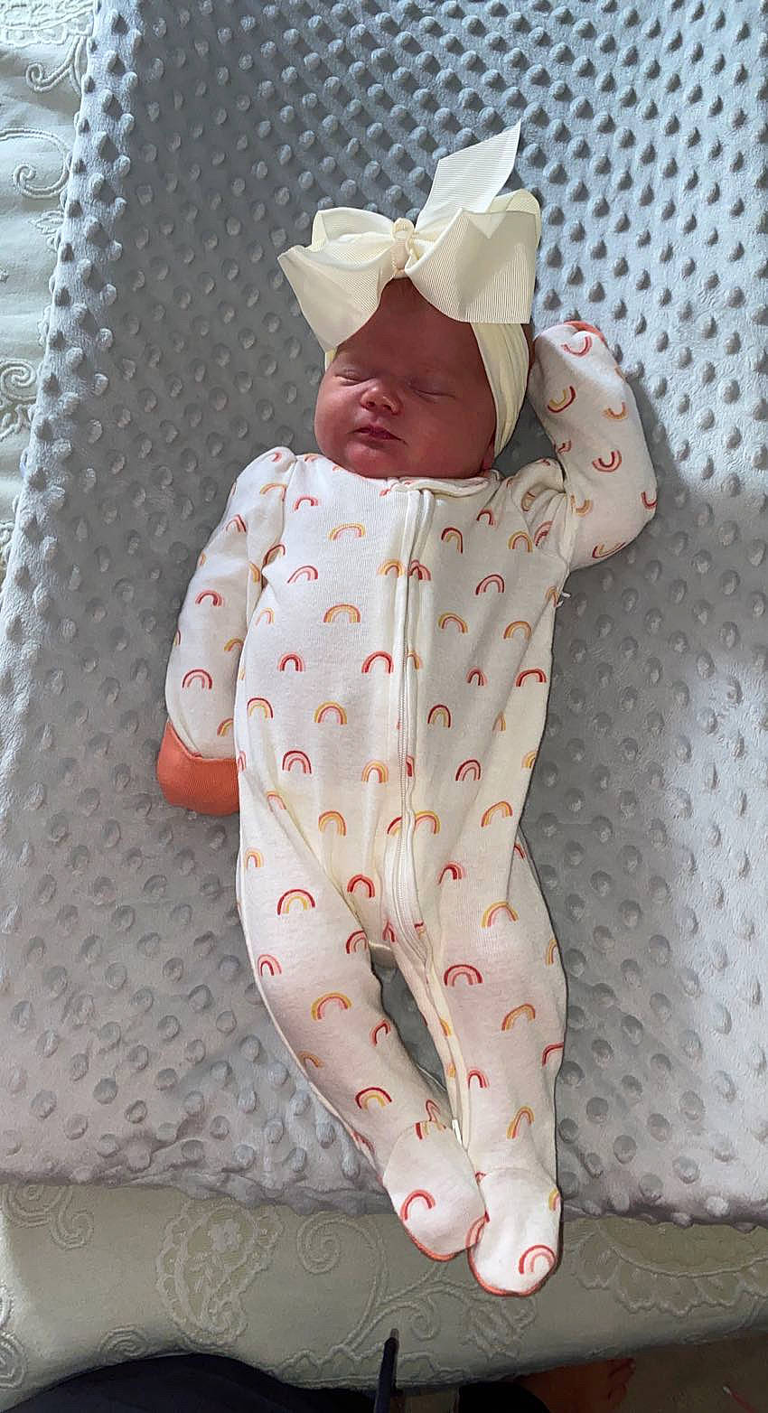 Ainzley joined the competition — help win amazing prizes! baby, baby_safety, baby_sleeping, baby_toddler_clothing, cap, child, collar, comfort, face, grey, hat, infant_bodysuit, linens, pattern, person, pink, product, sleeve, t_shirt, textile