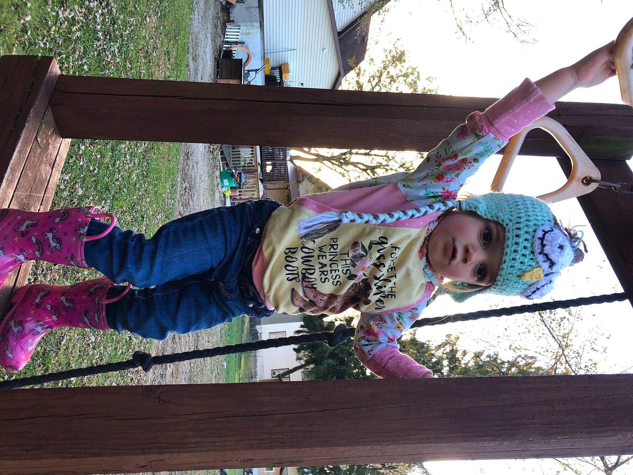 Raelynn is registered to the contest to win money with this photo: baby_toddler_clothing, black, child, city, event, fun, grass, happy, hat, headwear, leisure, magenta, person, plant, play, recreation, t_shirt, toddler, tree, wood