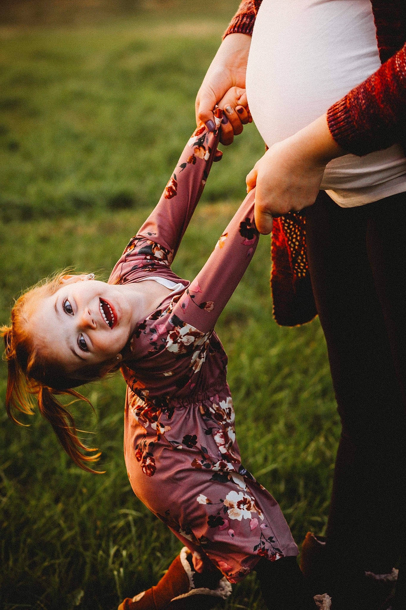 Raelynn is registered to the contest to win money with this photo: arm, boot, child, event, flash_photography, fun, gesture, grass, grassland, happy, human_leg, joy, leisure, people_in_nature, performance, performance_art, performing_arts, person, recreation, smile