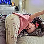 Alexandrya joined the competition — help win amazing prizes! toddler, child, pajamas, bed, blanket, cushion, television, indoor, person, face, stretching, pink_clothing, patterned_pants, soft_furnishing, playful, cute, home, resting, smiling, young_child
