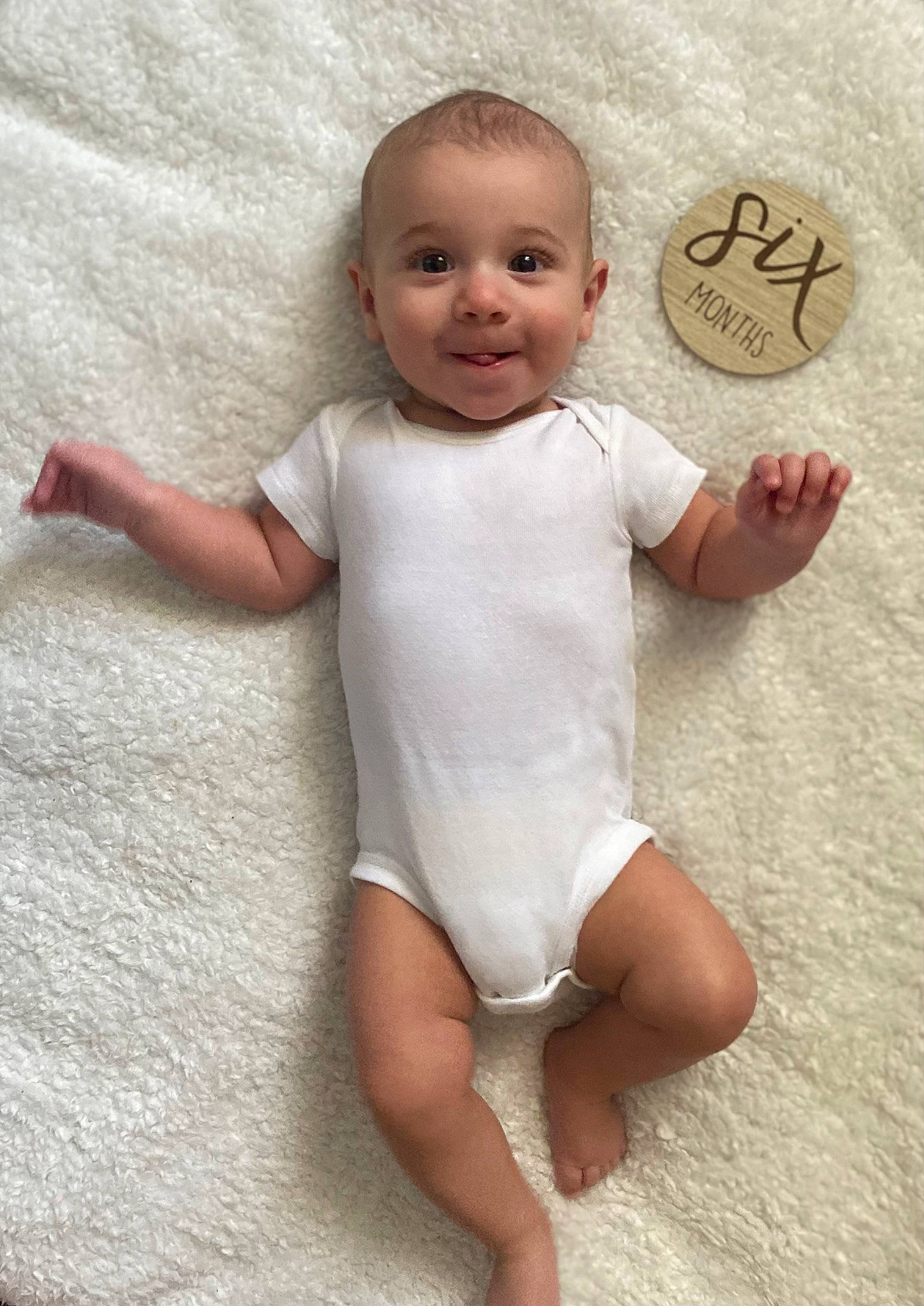Kaden joined the competition — help win amazing prizes! arm, baby, baby_toddler_clothing, barefoot, child, finger, flooring, gesture, happy, human_body, human_leg, joy, leg, pattern, person, skin, sleeve, smile, stomach, thigh