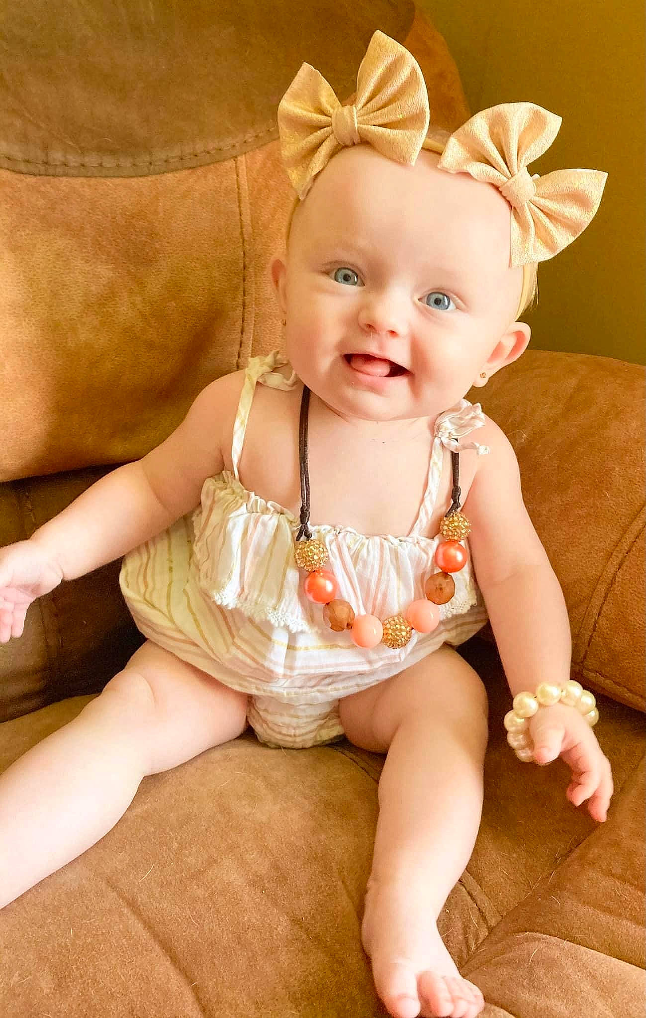Ember joined the competition — help win amazing prizes! arm, baby, baby_toddler_clothing, cheek, eye, face, facial_expression, finger, hand, happy, head, human_body, iris, lip, person, pink, skin, sleeve, smile, toddler