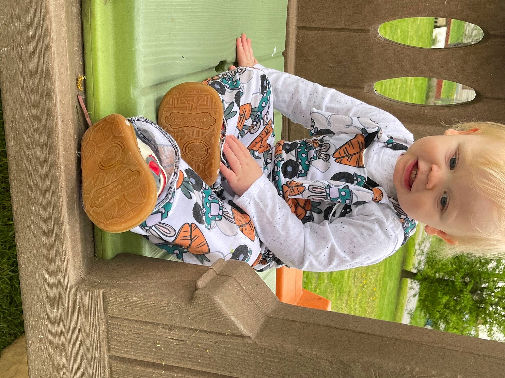 Brodie joined the competition — help win amazing prizes! baby, child, comfort, design, fedora, fun, grass, hat, leaf, leisure, orange, person, plant, room, sitting, smile, sun_hat, textile, toddler, window