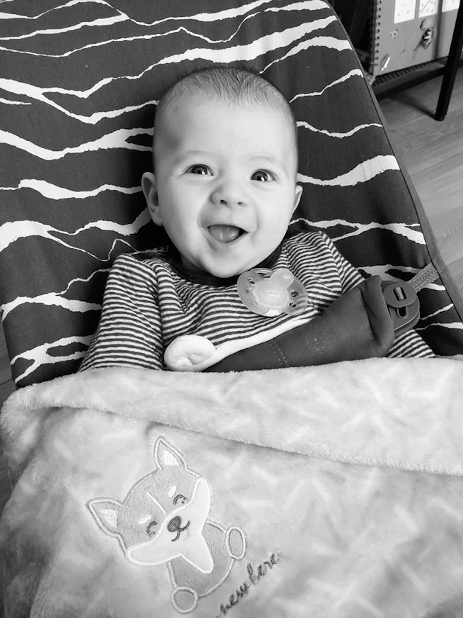 Ayden participe au concours pour gagner de l'argent avec cette photo : baby, black, black_and_white, child, comfort, cool, facial_expression, flash_photography, hairstyle, happy, human, monochrome, organ, person, product, sleeve, smile, standing, style, toddler