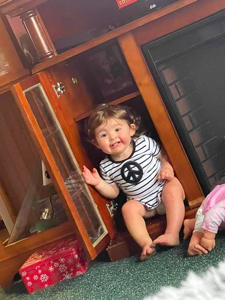 Marilyn joined the competition — help win amazing prizes! baby, baby_toddler_clothing, comfort, flash_photography, floor, flooring, foot, fun, happy, hardwood, human_leg, knee, person, room, shorts, sitting, smile, t_shirt, thigh, toddler