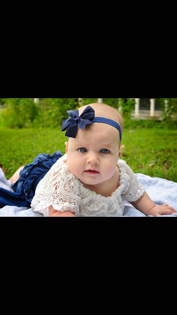 Justice joined the competition — help win amazing prizes! baby, cheek, child, ear, eye, fashion_accessory, hair_accessory, head, headband, headgear, headpiece, headwear, person, photo_shoot, photograph, photography, portrait_photography, skin, snapshot, stock_photography