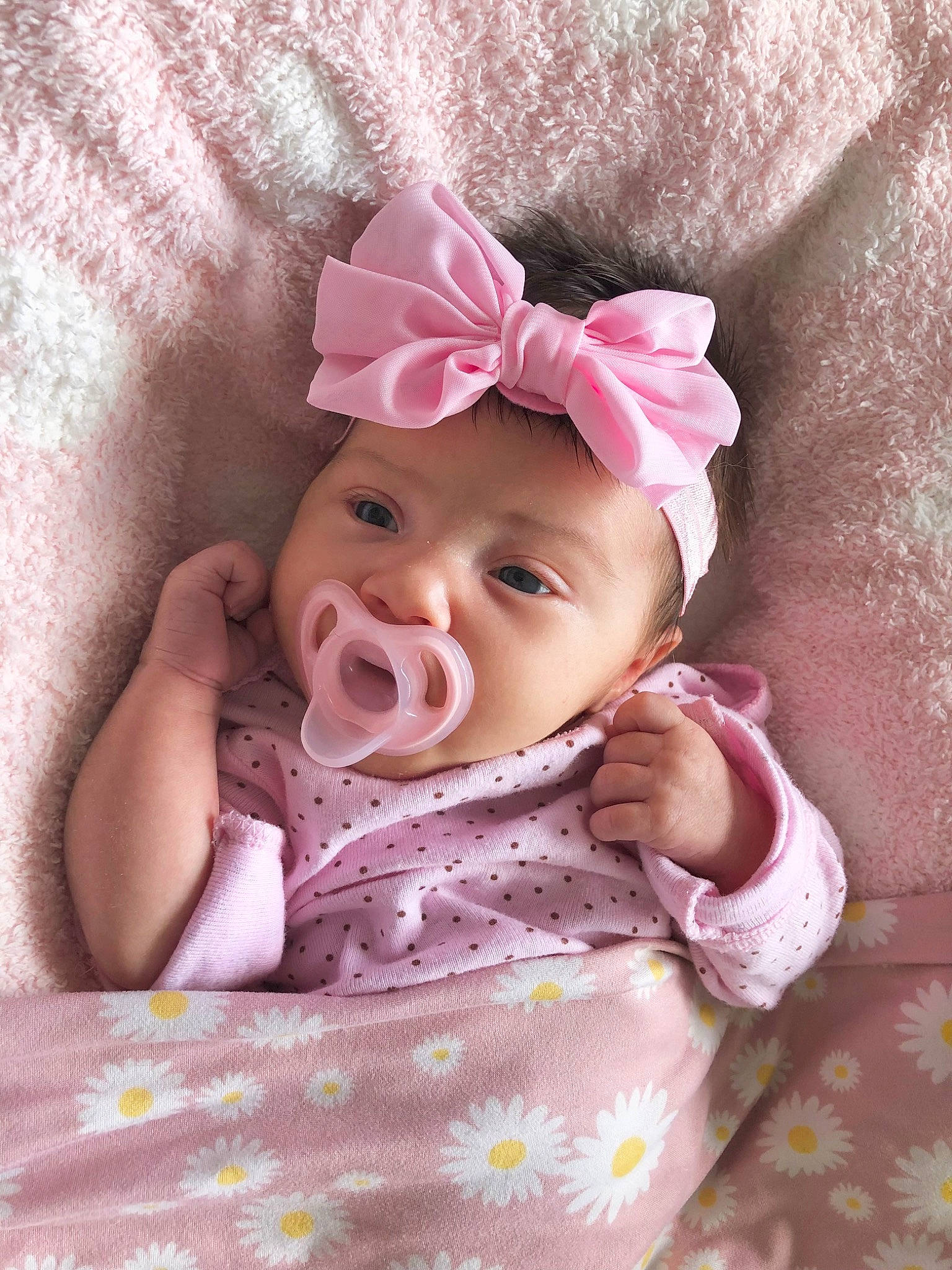 Emry is registered to the contest to win money with this photo: baby, baby_products, baby_toddler_clothing, cheek, child, comfort, costume_hat, eye, head, headband, headgear, headpiece, headwear, linens, lip, magenta, person, pink, purple, sleeve