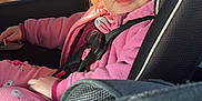 Zoey is registered to the contest to win money with this photo: toddler, child, car_seat, pink_clothing, seatbelt, window, excavator, construction, sunlight, blonde_hair, curious, car_interior, seatbelt_strap, casual, daytime, portrait, vehicle, safety, young_child, looking