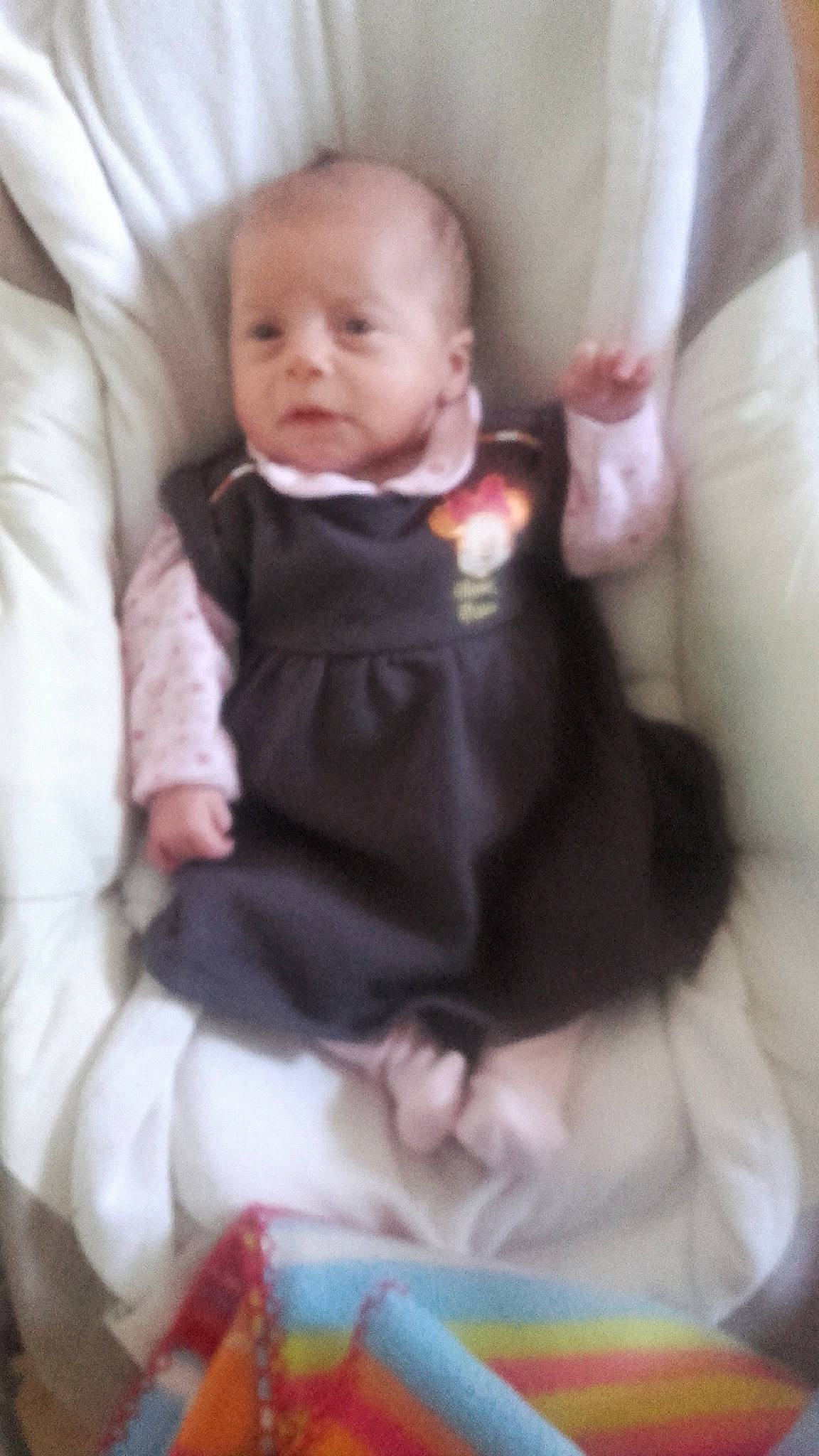 Lucie participe au concours pour gagner de l'argent avec cette photo : child, girl, head, infant, person, product, sitting, skin, toddler