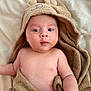 Thomas participe au concours pour gagner de l'argent avec cette photo : baby, towel, blanket, face, skin, cute, child, infant, soft, cozy, eyes, portrait, naked, expression, lying_down, warm, indoors, headwear, chubby_cheeks, peaceful