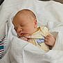 Rowan joined the competition — help win amazing prizes! newborn, baby, sleeping, blanket, soft, clothing, hand, peaceful, infant, cute, indoors, rest, wrapped, tiny, face, calm, child, person, comfort, portrait
