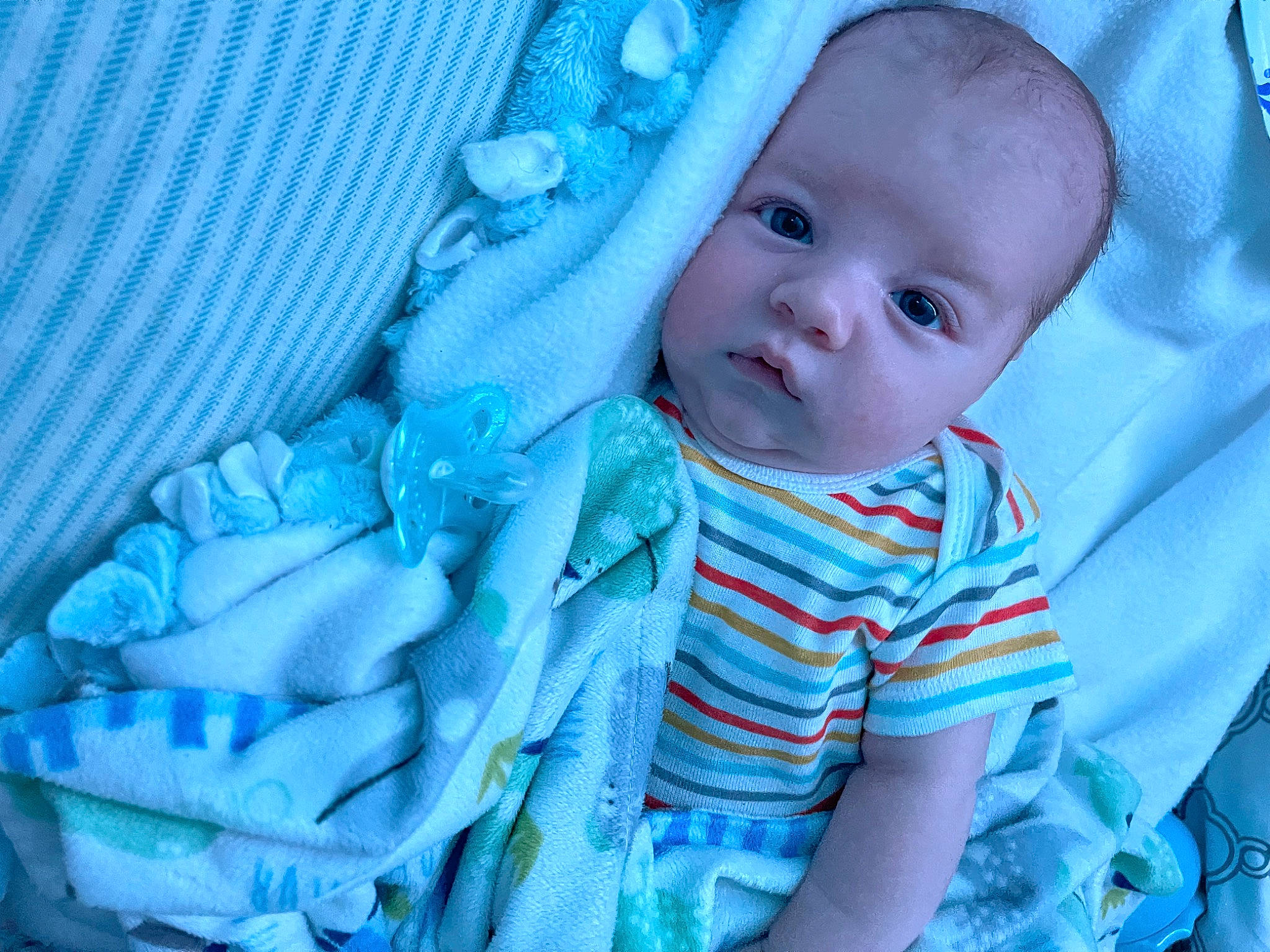 Carson joined the competition — help win amazing prizes! aqua, azure, baby, baby_products, baby_toddler_clothing, blue, cheek, child, comfort, electric_blue, eye, grass, happy, iris, linens, pattern, person, skin, sleeve, textile