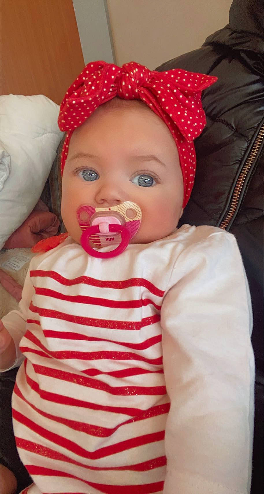 Kelsy participe au concours pour gagner de l'argent avec cette photo : baby, baby_toddler_clothing, cap, cheek, child, chin, costume_hat, eye, fashion_accessory, fun, happy, hat, lip, mouth, nose, outerwear, person, pink, skin, sleeve