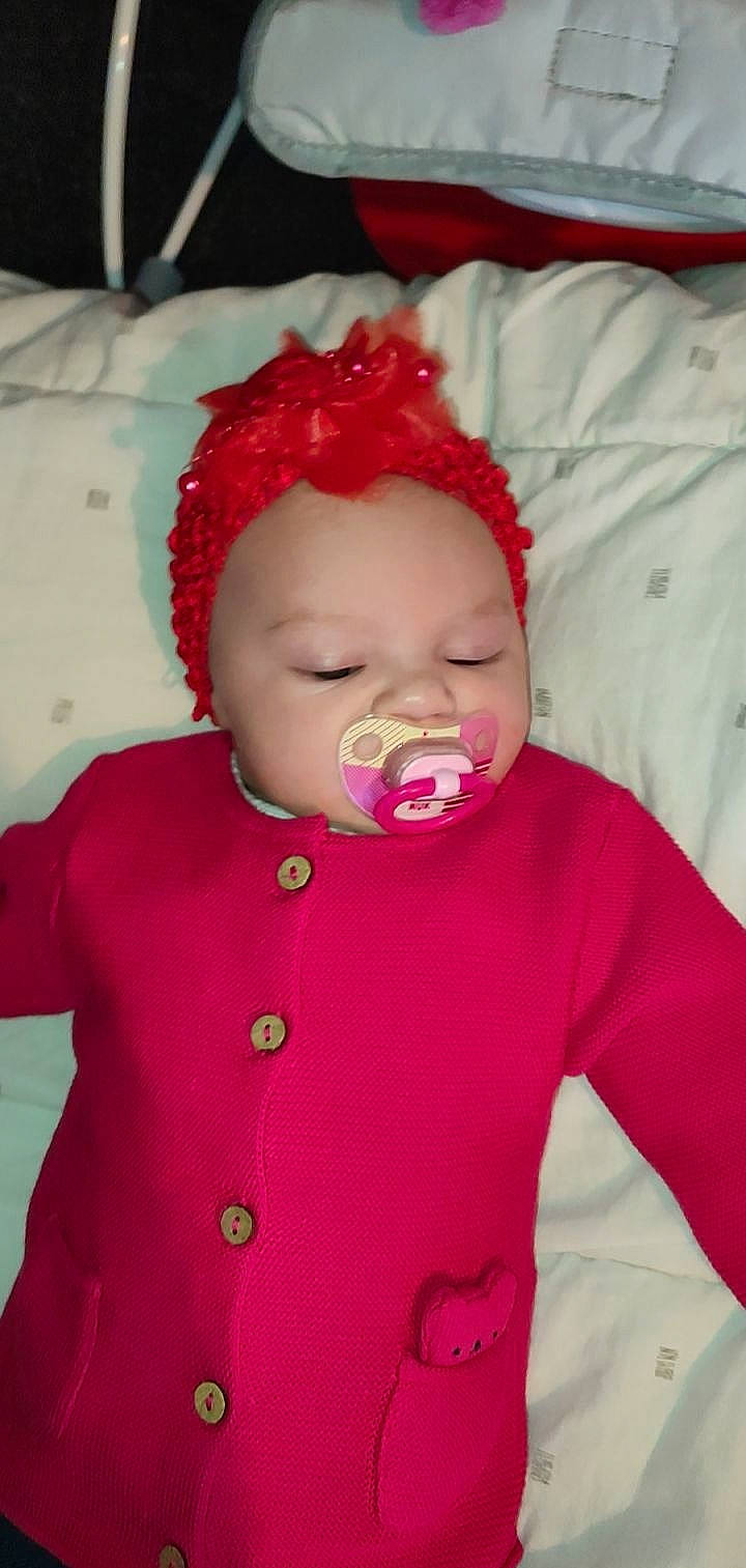 Kelsy participe au concours pour gagner de l'argent avec cette photo : baby, baby_products, baby_toddler_clothing, cheek, child, eye, eyebrow, happy, head, headwear, human_body, iris, lip, magenta, mouth, nose, person, pink, skin, sleeve