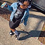 alloywheel, car, carwheel, child, clothing, face, female, footwear, girl, head, jeans, machine, pants, path, person, photography, portrait, shoe, sidewalk, spoke