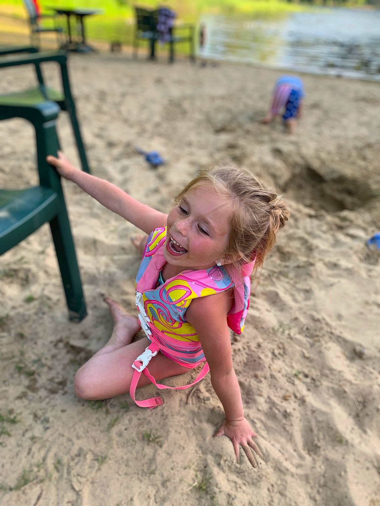 Maycee is registered to the contest to win money with this photo: beach, child, fun, happy, joy, leisure, mud, outdoor_play_equipment, person, play, playground, public_space, recreation, sand, smile, soil, summer, vacation