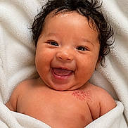 Kaiyomi joined the competition — help win amazing prizes! baby, smiling, curly_hair, blanket, happy, infant, face, skin, cute, portrait, child, young, expression, lying_down, wrapped, warm, cheerful, indoors, head, person