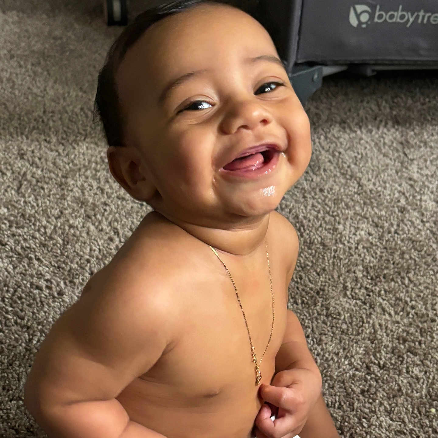 Marcus is registered to the contest to win money with this photo: accessories, ankle, baby, babylaughing, bodypart, face, finger, hand, happy, head, jewelry, laughing, necklace, person, photography, portrait, sitting, smile, strap, toe
