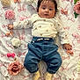 baby, infant, child, face, clothing, shirt, pants, denim, socks, flowers, roses, bows, blanket, pattern, cute, lying, indoors, decorative, soft, portrait