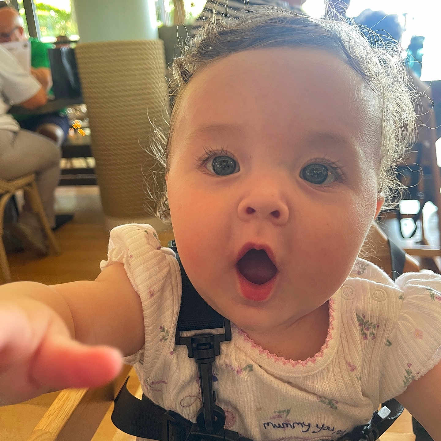 Harlow is registered to the contest to win money with this photo: adult, baby, bodypart, cutlery, face, female, finger, furniture, hand, head, indoors, male, man, person, photography, portrait, restaurant, spoon, woman, wood