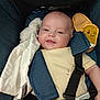 Kai joined the competition — help win amazing prizes! baby, smiling, car_seat, blanket, yellow_slipper, blue_fabric, safety_harness, child, cute, infant, toy, comfort, closeup, happy, face, indoor, sitting, soft_toy, clothing, rest