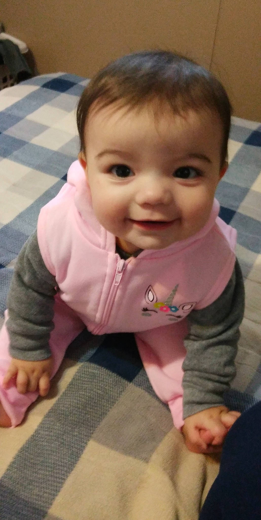 Isabella is registered to the contest to win money with this photo: baby_toddler_clothing, cheek, chin, facial_expression, finger, flooring, hair, head, iris, lip, mammal, mouth, nose, person, pink, product, skin, sleeve, smile, standing