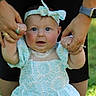 Mckenna is registered to the contest to win money with this photo: baby, blue_eyes, child, childhood, cute, dress, family, grass, hands, happy, headband, holding_hands, infant, nature, outdoor, person, portrait, smile, summer, sunlight