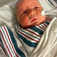 Oliver is registered to the contest to win money with this photo: newborn, baby, hospital, blanket, medical_patch, infant, face, swaddled, bed, patient, healthcare, toddler, cute, sleeping, closeup, person, skin, newborn_baby, hospital_bed, resting