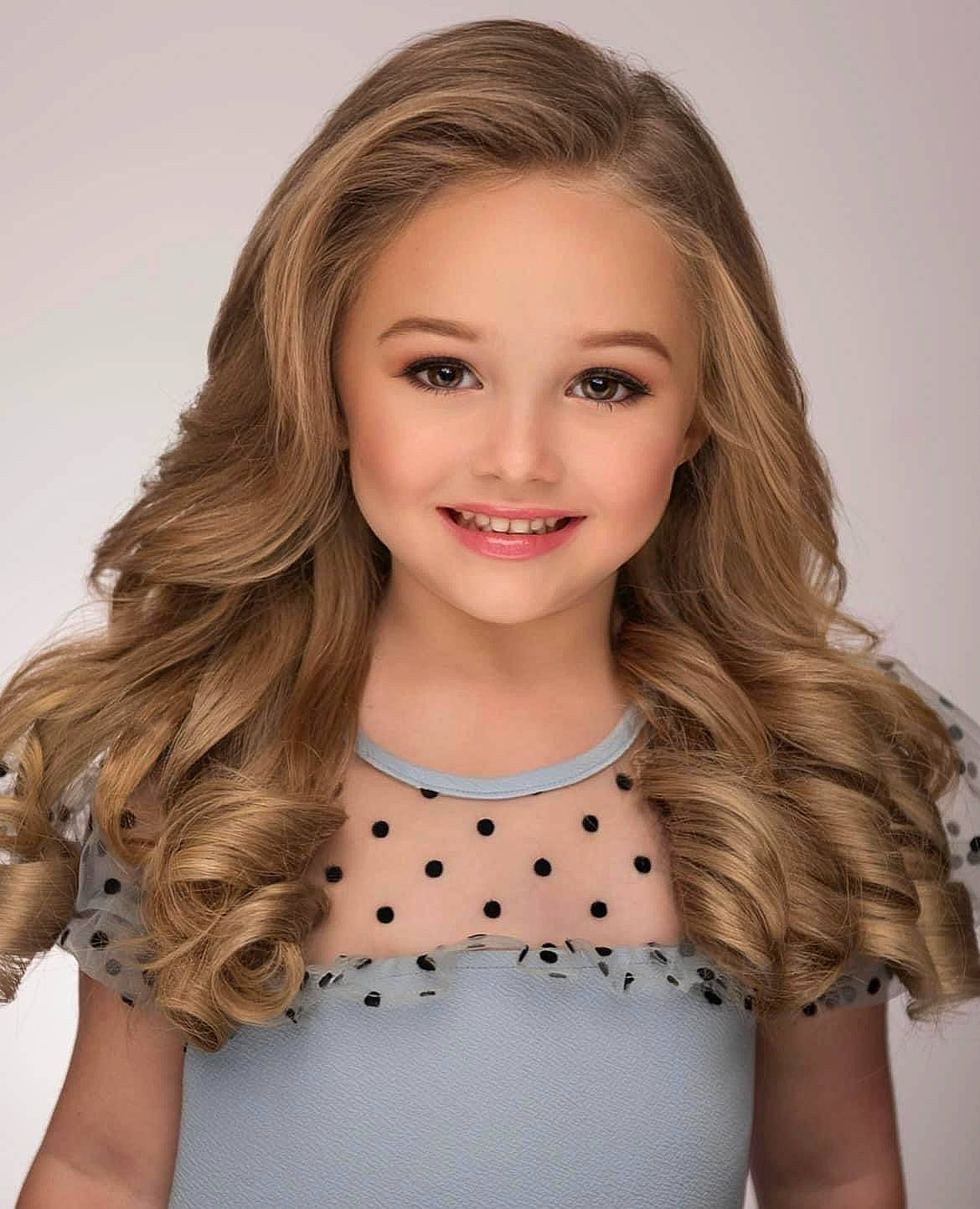 Kentleigh is registered to the contest to win money with this photo: cheek, chin, collar, day_dress, eyebrow, eyelash, facial_expression, fashion, fashion_design, flash_photography, hairstyle, happy, iris, joy, layered_hair, lip, makeover, neck, person, skin